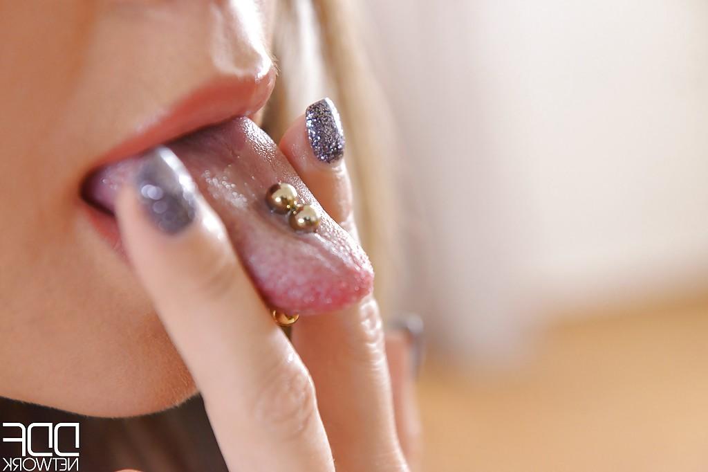 16P Pretty solo babe Natalia Forrest showing off pierced tongue up close
