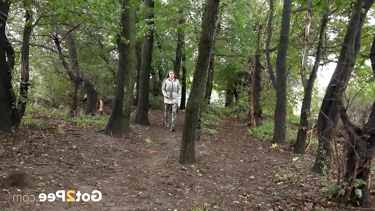 15P Solo girl Barbe pulls down her pants to pee in the forest