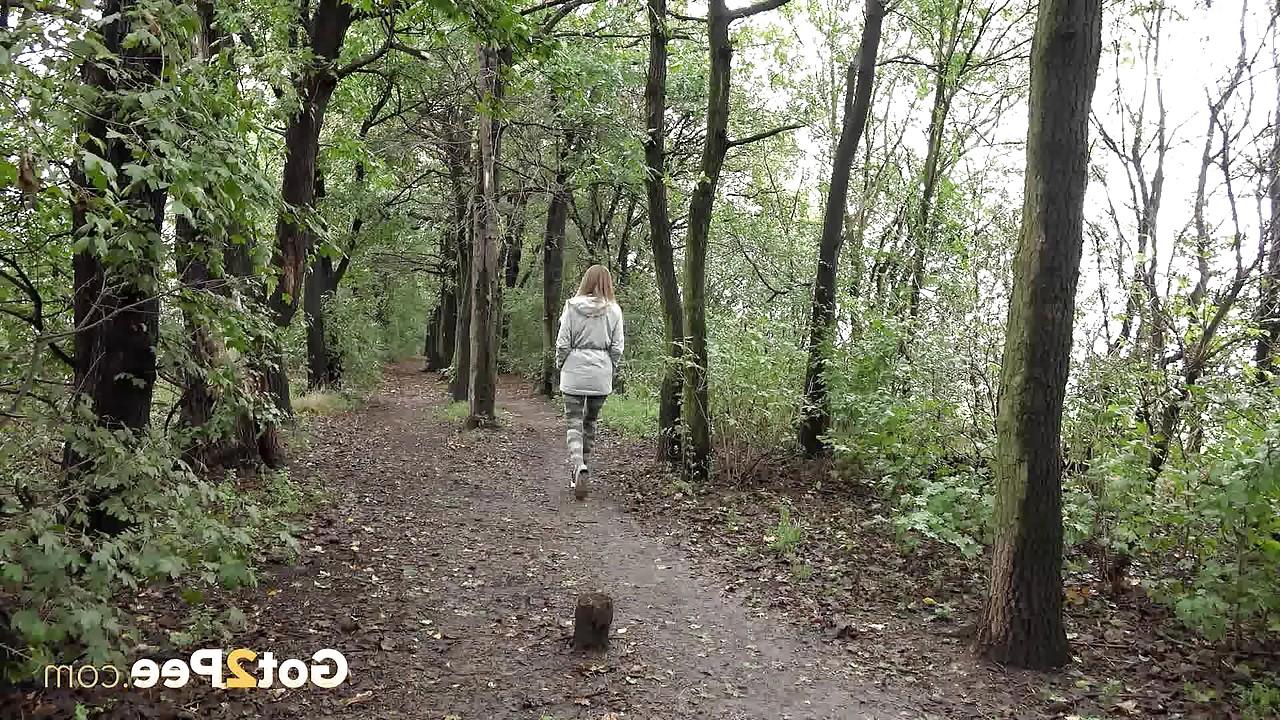 15P Solo girl Barbe pulls down her pants to pee in the forest