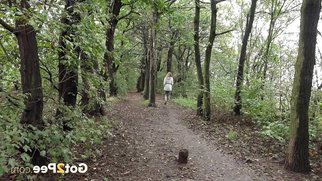15P Solo girl Barbe pulls down her pants to pee in the forest