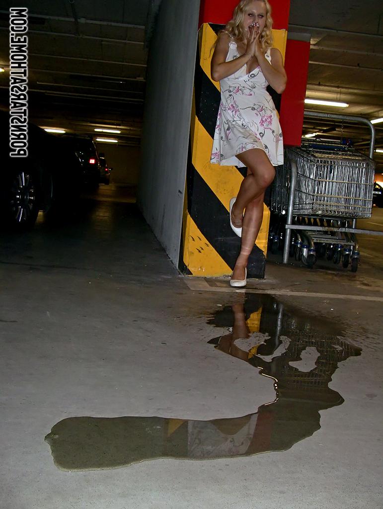 16P Lustful blonde pornstar doing upskirt and pissing in public place