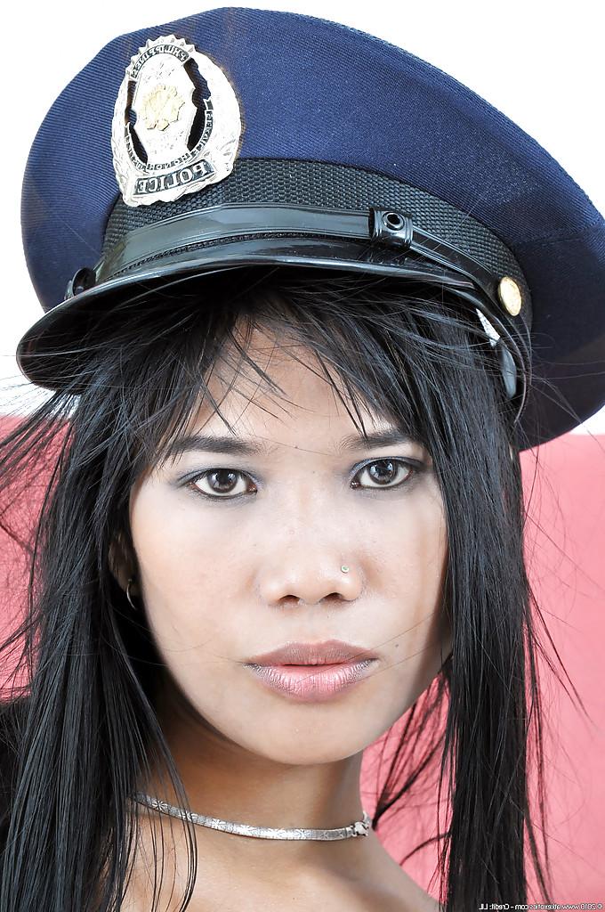 16P Latina babe Anne wears dirty police officer outfit and shows butt