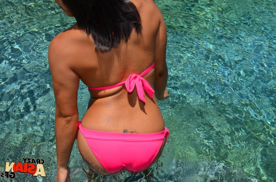16P Asian first timer Mia removes bikini in swimming pool to finger shaved cunt