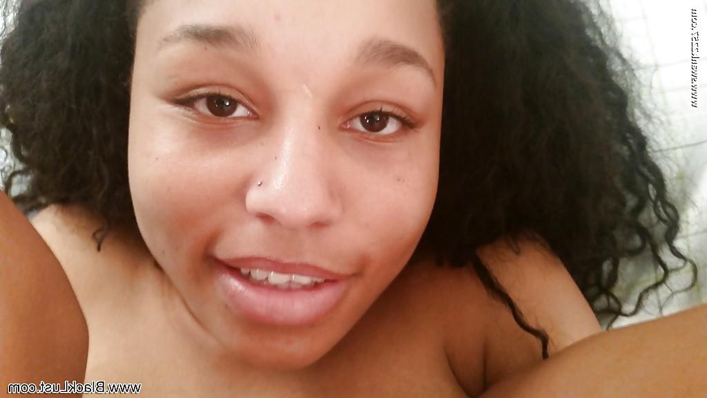 16P Lovely close up shots of busty ebony Alana playing with a white cock