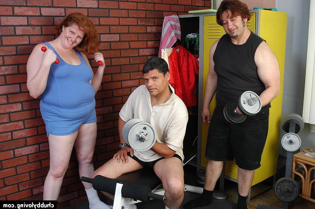 16P Fat older redhead Adrienne sucks and fucks two cocks in weight room
