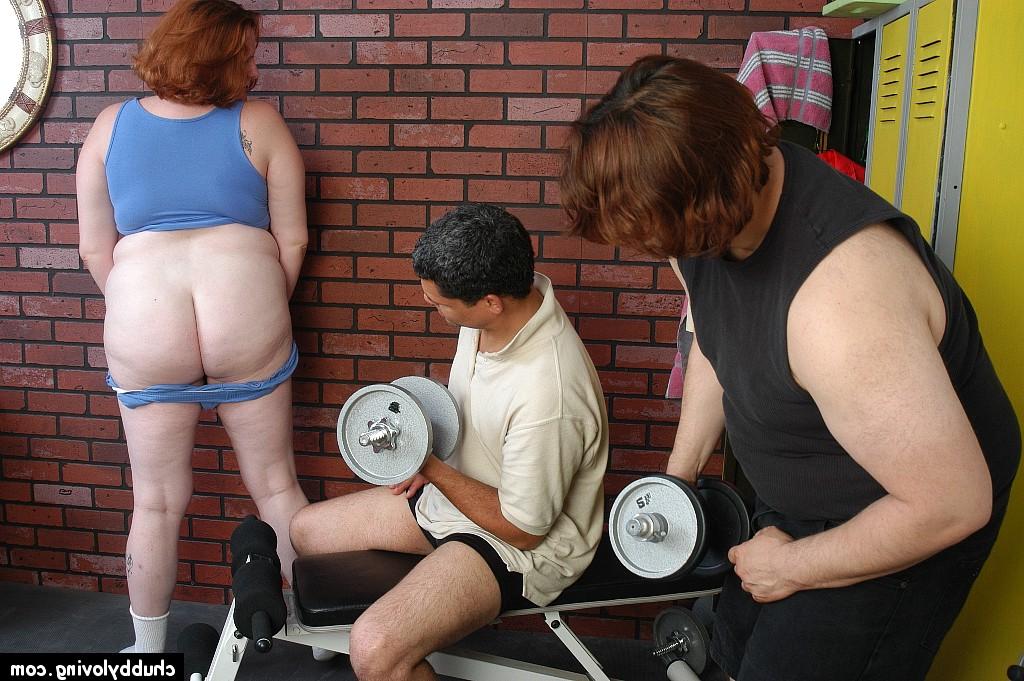 16P Fat older redhead Adrienne sucks and fucks two cocks in weight room