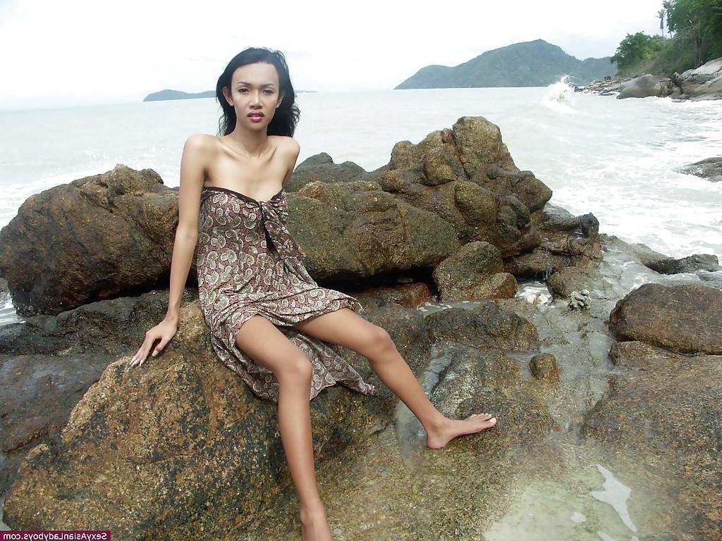 12P Hot and busty Thai ladyboy skinny dipping on a Phuket's beach
