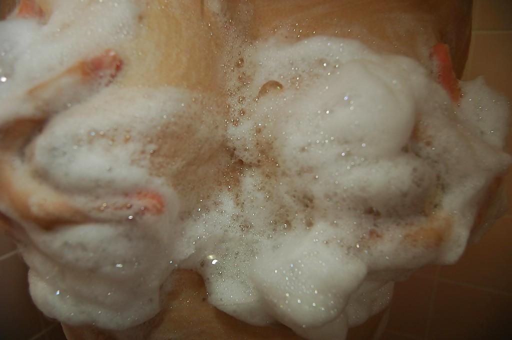 16P Asian chick Ayumi Shoda is washing her hairy pussy and natural tits
