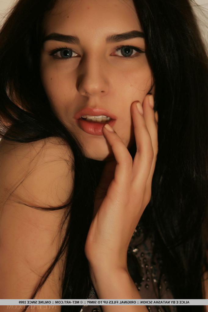 18P Fully clothed brunette Alice E strips mini dress to display pierced tits