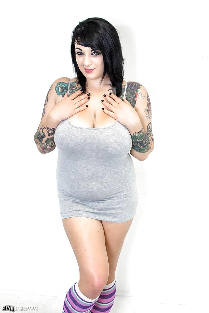 12P Wonderful clothed beauty Scarlet Lavey teasing her big tits