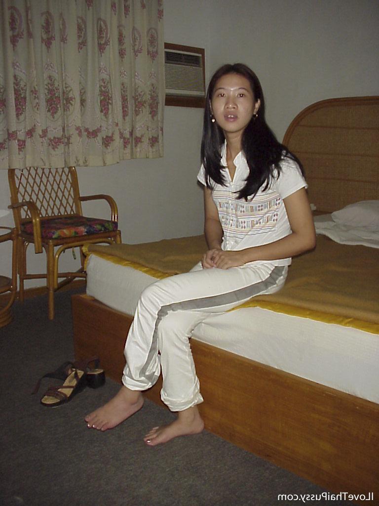 16P Naughty asian babe taking off her clothes and posing on the bed