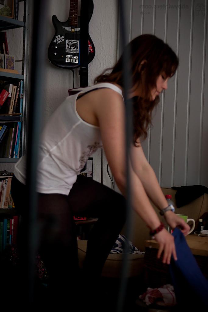 16P Naughty voyeur shots of young babe Bea getting dressed after nude modelling