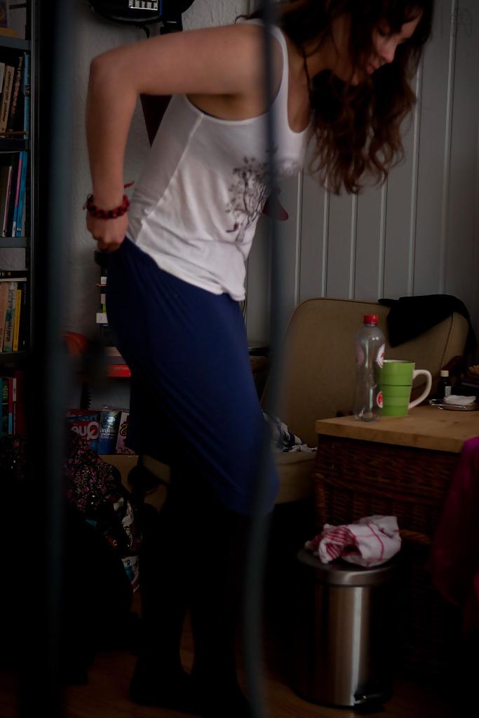 16P Naughty voyeur shots of young babe Bea getting dressed after nude modelling