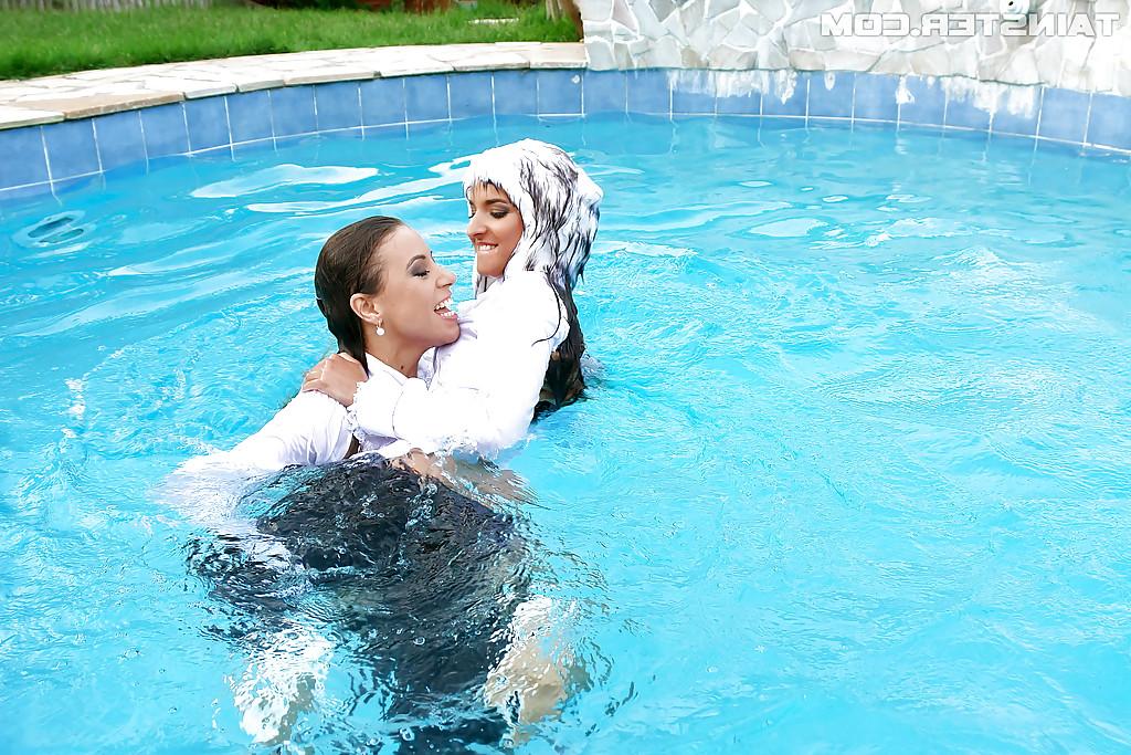 16P Nikky Thorne has some wet fully clothed pool fun with herfriend