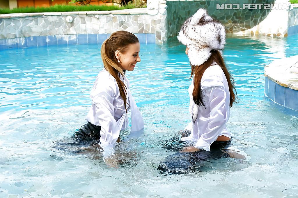 16P Nikky Thorne has some wet fully clothed pool fun with herfriend