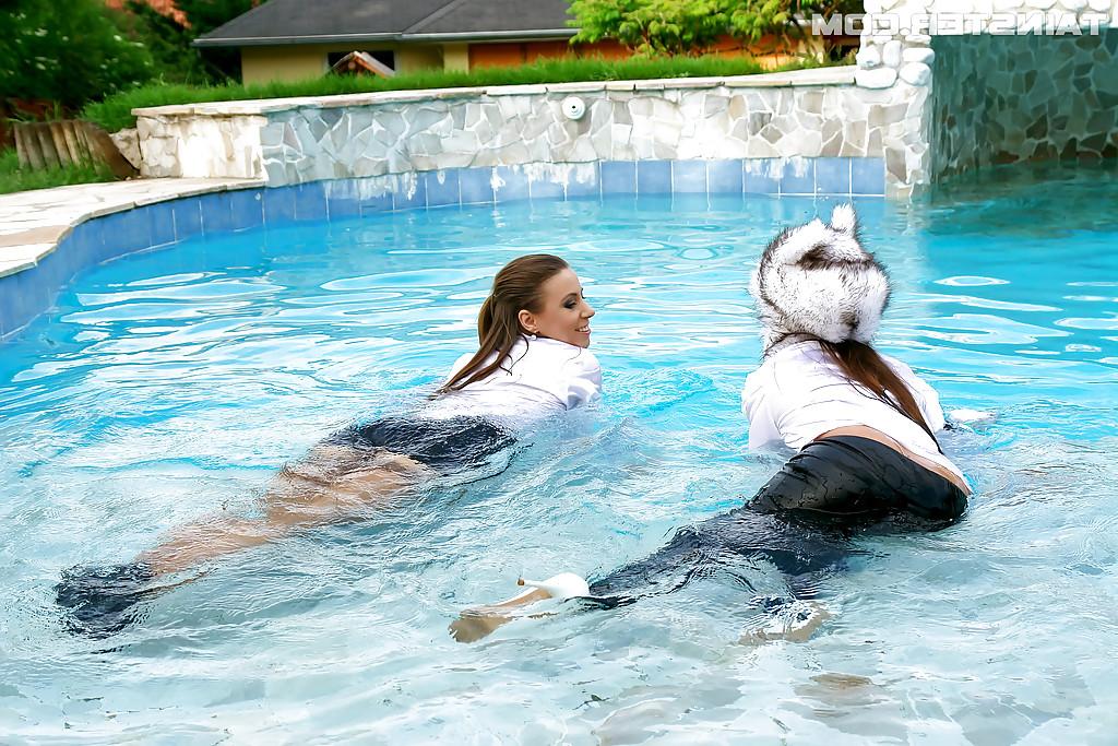 16P Nikky Thorne has some wet fully clothed pool fun with herfriend