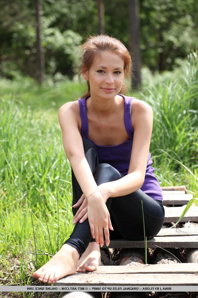 18P Flat chested Irina J doffs yoga pants outside and shows her hairy pussy