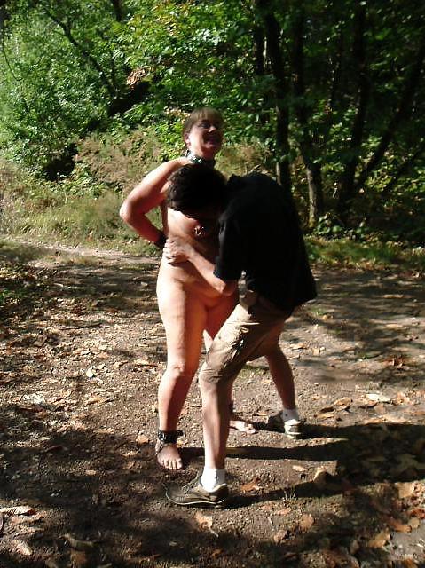 25P Naked in chains in public.