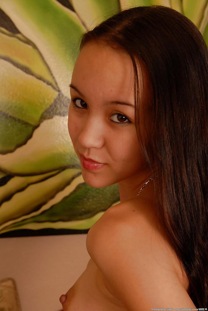 16P Barely legal Asian spinner Amai Liu posing fully clothed before stripping