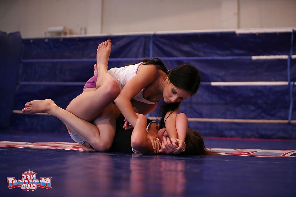 16P Sporty babes Amanda Moore and her friend fighting and kissing each other