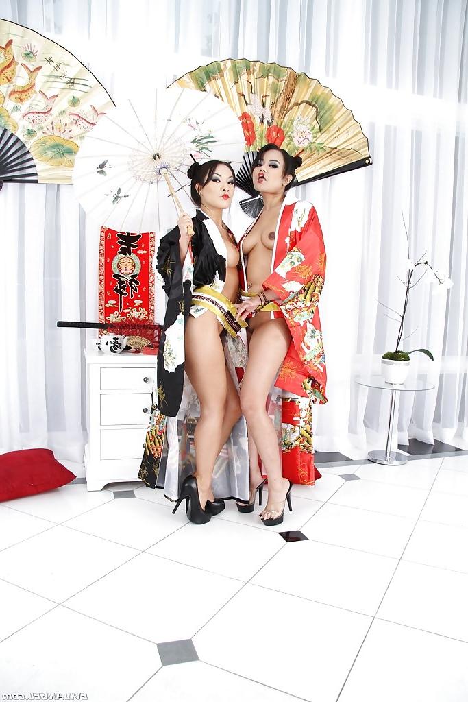 16P Sexy asian MILFs Annie Cruz & Asa Akira posing with toys in their assholes
