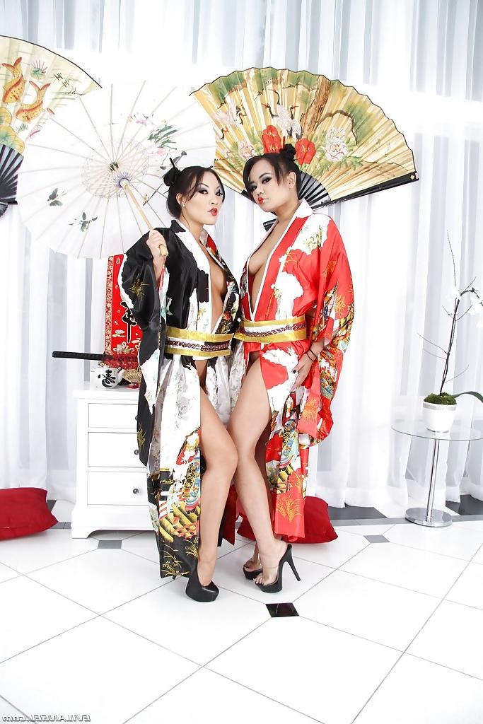 16P Asian vixens Annie Cruz & Asa Akira stripping and playing with butt plugs