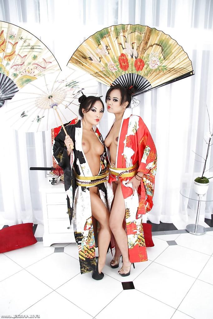 16P Asian vixens Annie Cruz & Asa Akira stripping and playing with butt plugs