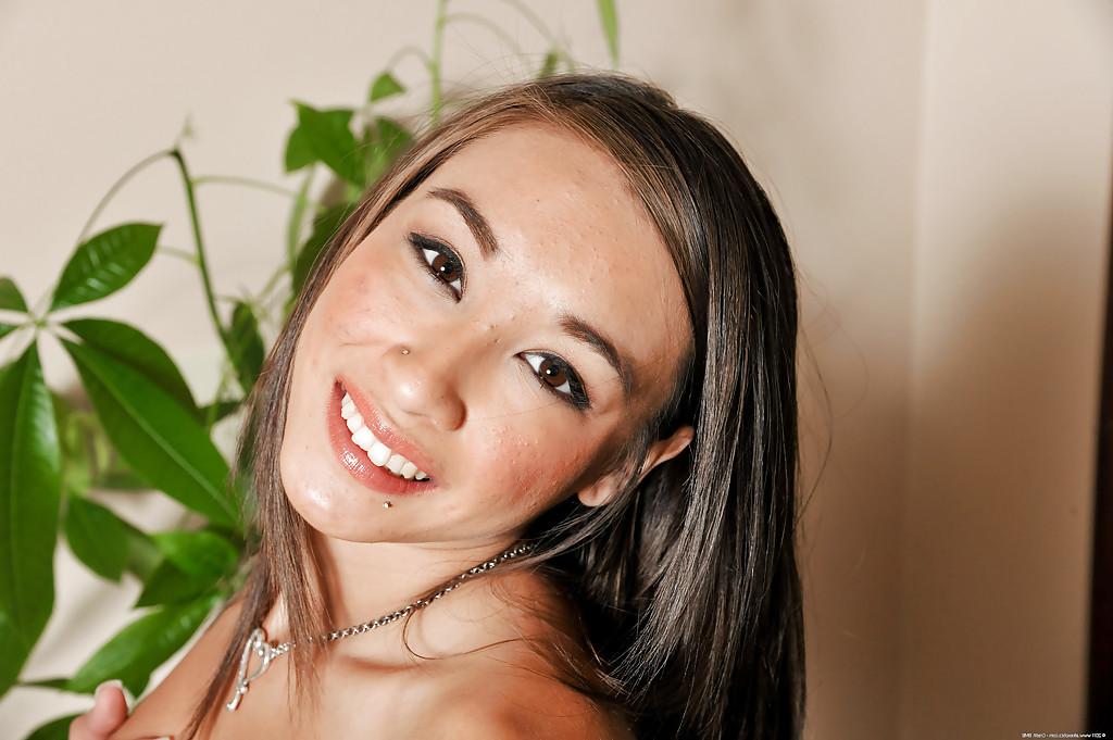 16P Happy Asian babe Arial Rose gets filmed in amateur solo clip