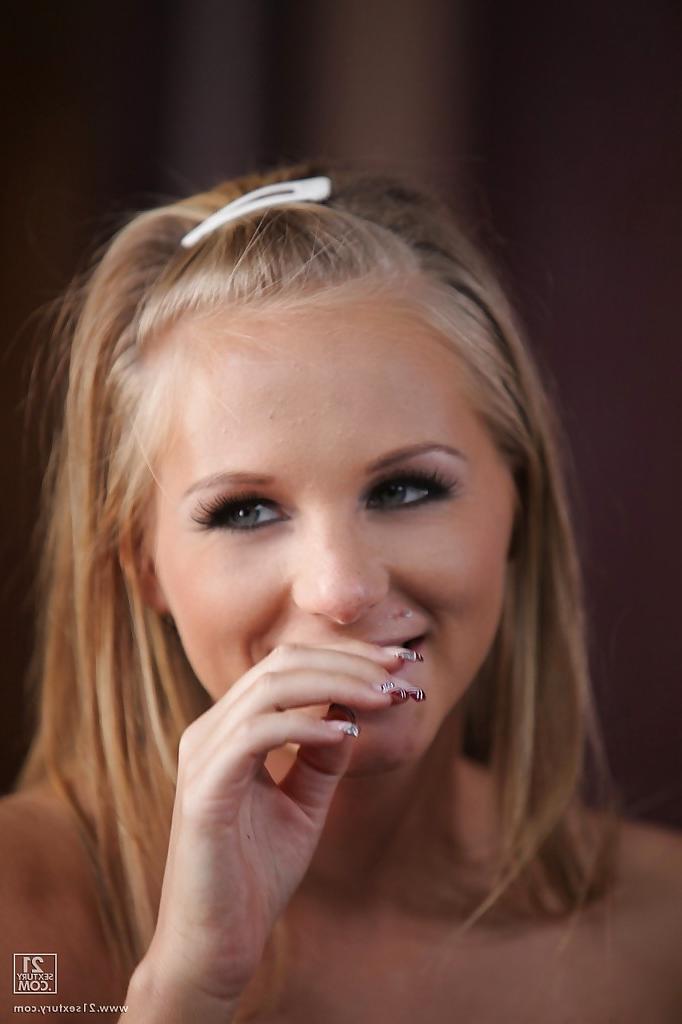 12P Blonde babe Barbie White has her European big tits shown in close up