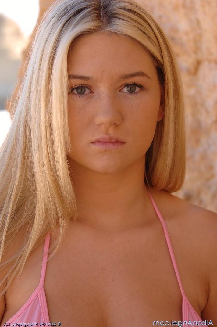 20P Pictures of Alison Angel getting nude on a beach