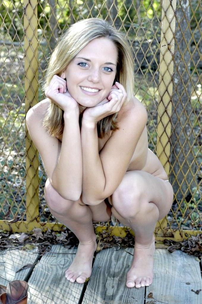 16P Pictures of All About Ashley stripping totally nude outside