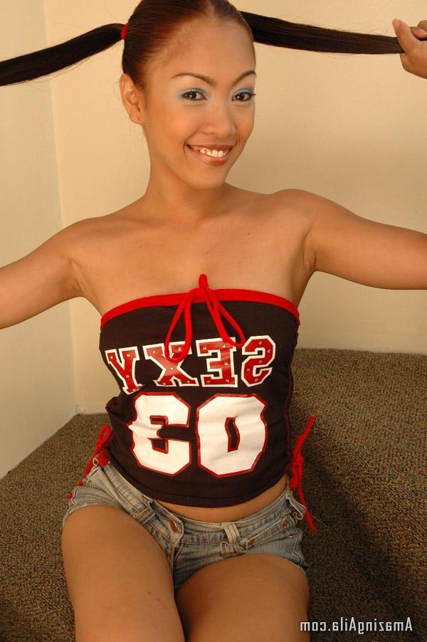 15P Pictures of teen babe Amazing Aila teasing you in pigtails