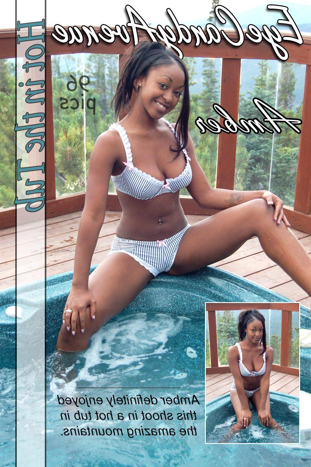 16P Busty ebony girl Amber gets naked in a hot tub