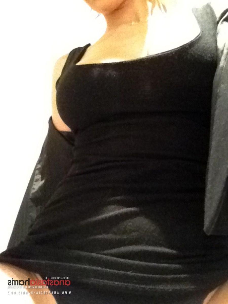 12P Anastasia Harris stips from her little black dress