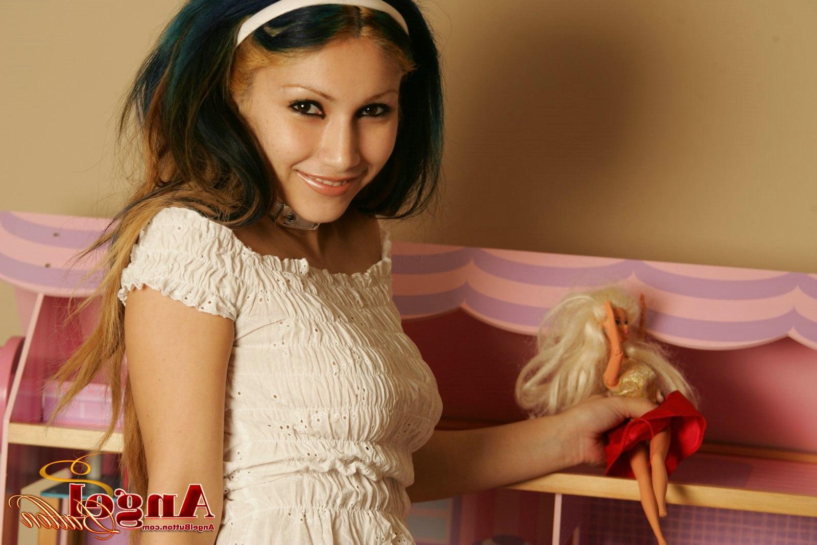 15P Pictures of Angel Button taking off her shirt