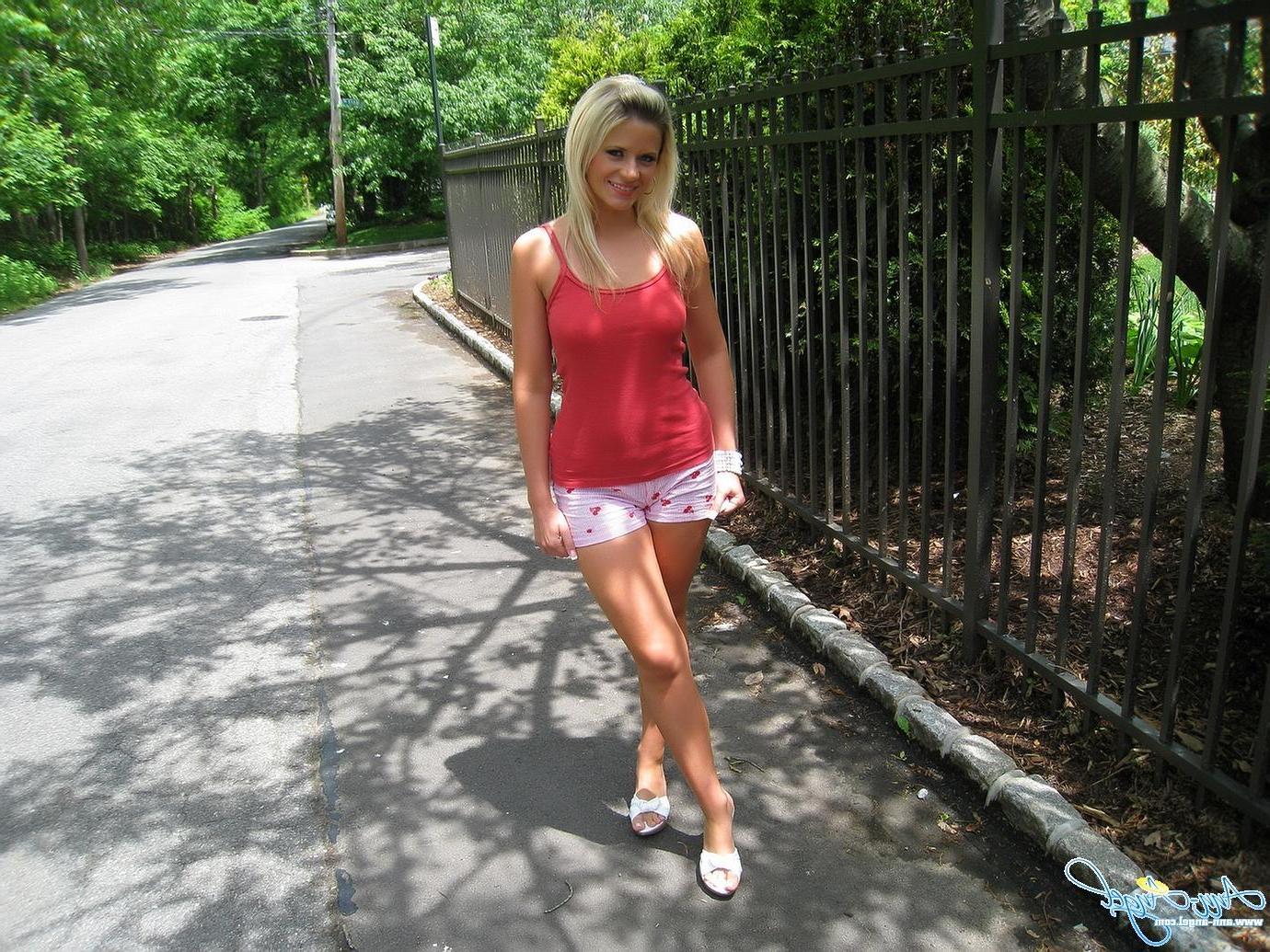 16P Candid shots of Ann Angel showing off her sexy body on a walk
