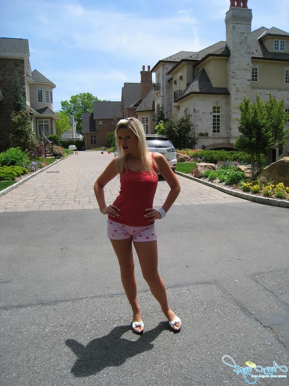 16P Candid shots of Ann Angel showing off her sexy body on a walk