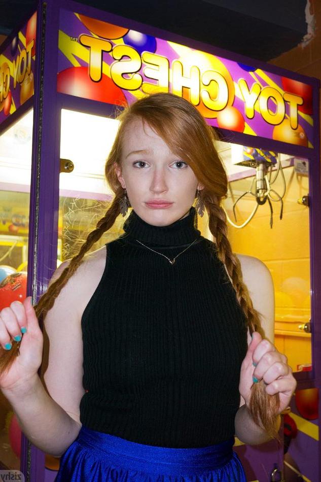 8P Beautiful redhead Bree Abernathy has some fun at an arcade