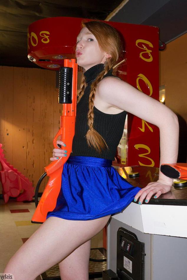 8P Beautiful redhead Bree Abernathy has some fun at an arcade