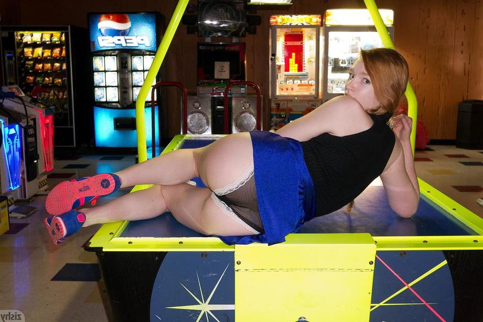 8P Beautiful redhead Bree Abernathy has some fun at an arcade