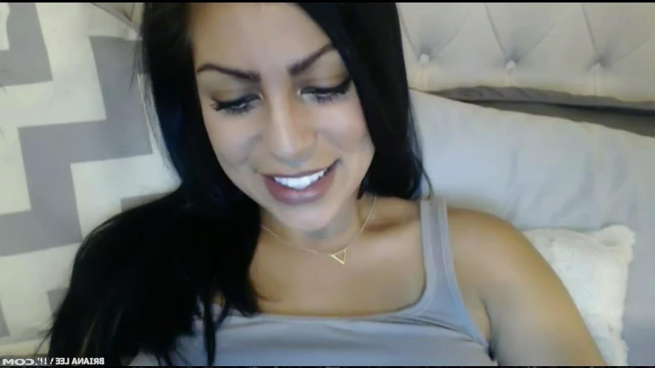 15P Busty brunette Briana Lee pleasures both of her holes in bed
