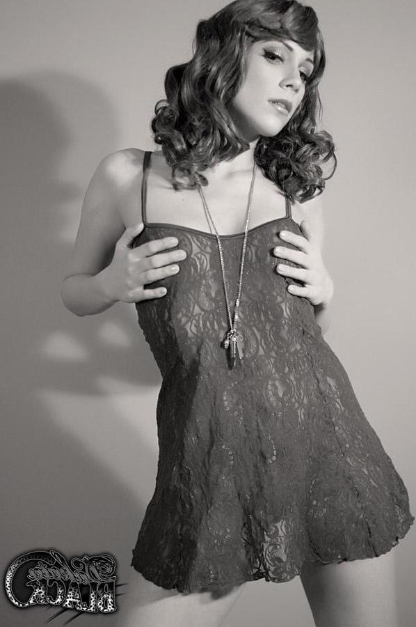 20P Pictures of teen hottie Dakota Black exposing her tits