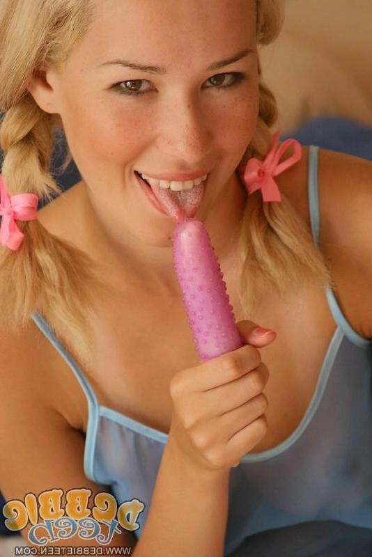 20P Pictures of Debbie Teen playing with her vibrator