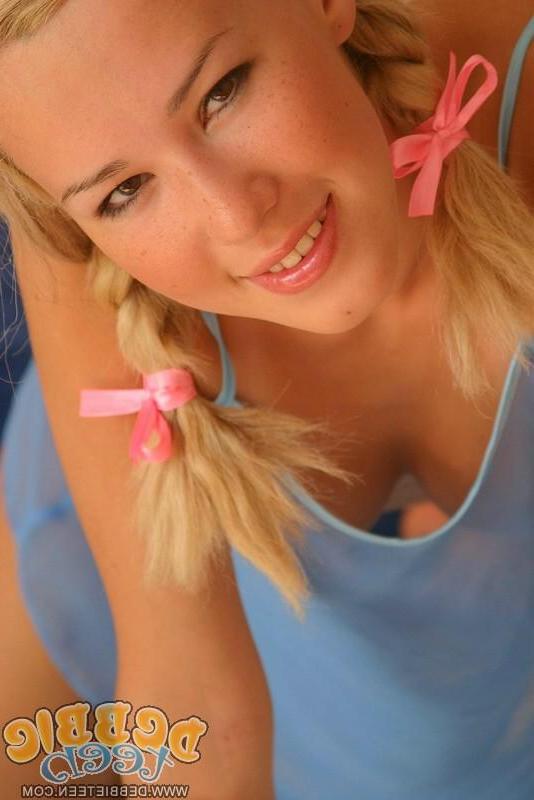 20P Pictures of Debbie Teen playing with her vibrator