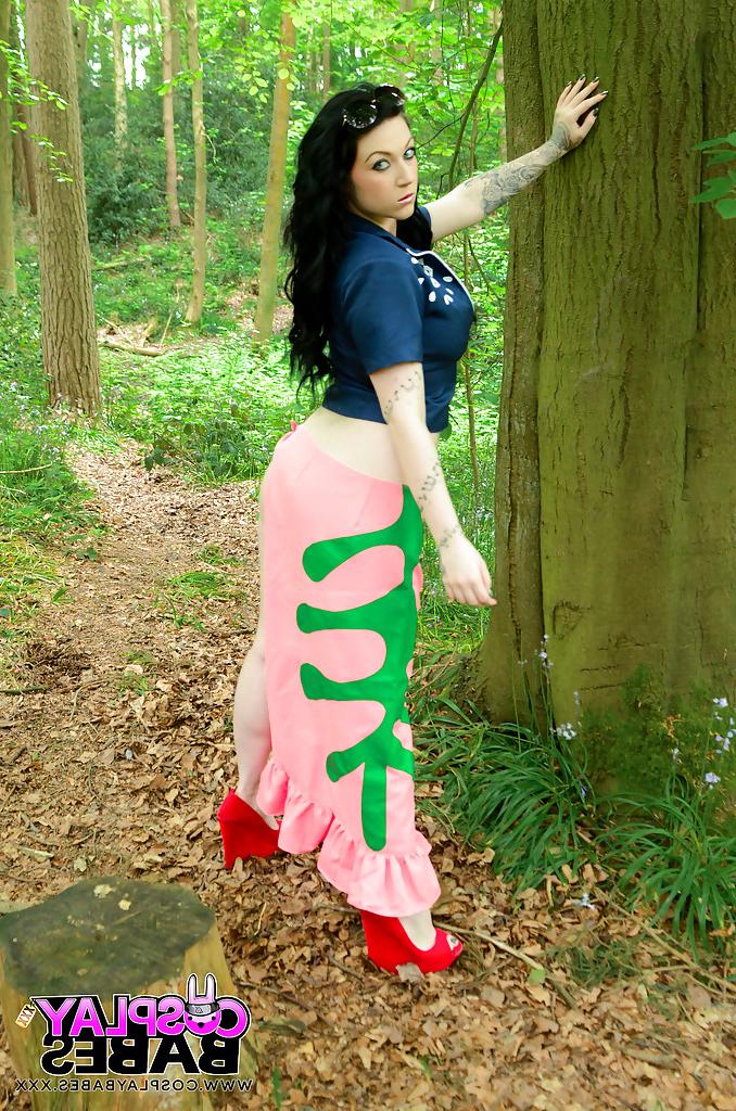 16P Busty brunette chick Harmony Reigns posing in woods for non nude pics