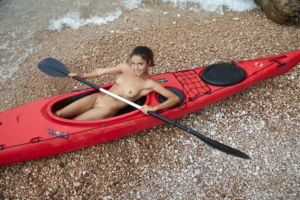 15P Brunette cutie Divina A enjoys kayaking in the nude