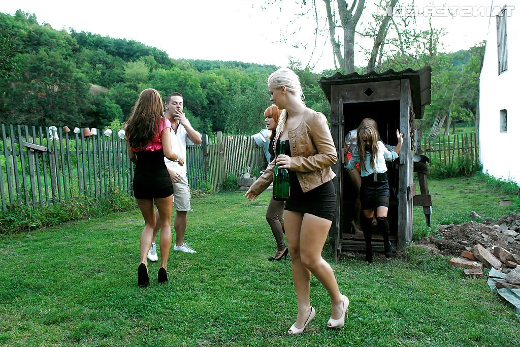 16P Lusty european sluts have some fully clothed pissing fun with a inky lad