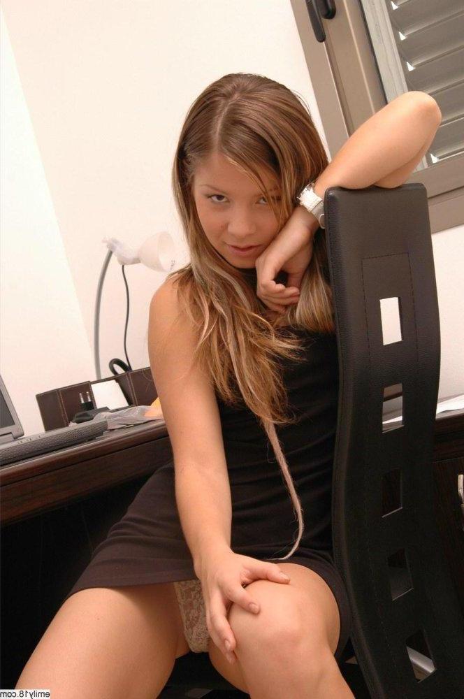 15P Emily 18 wearing a sexy black dress in the office