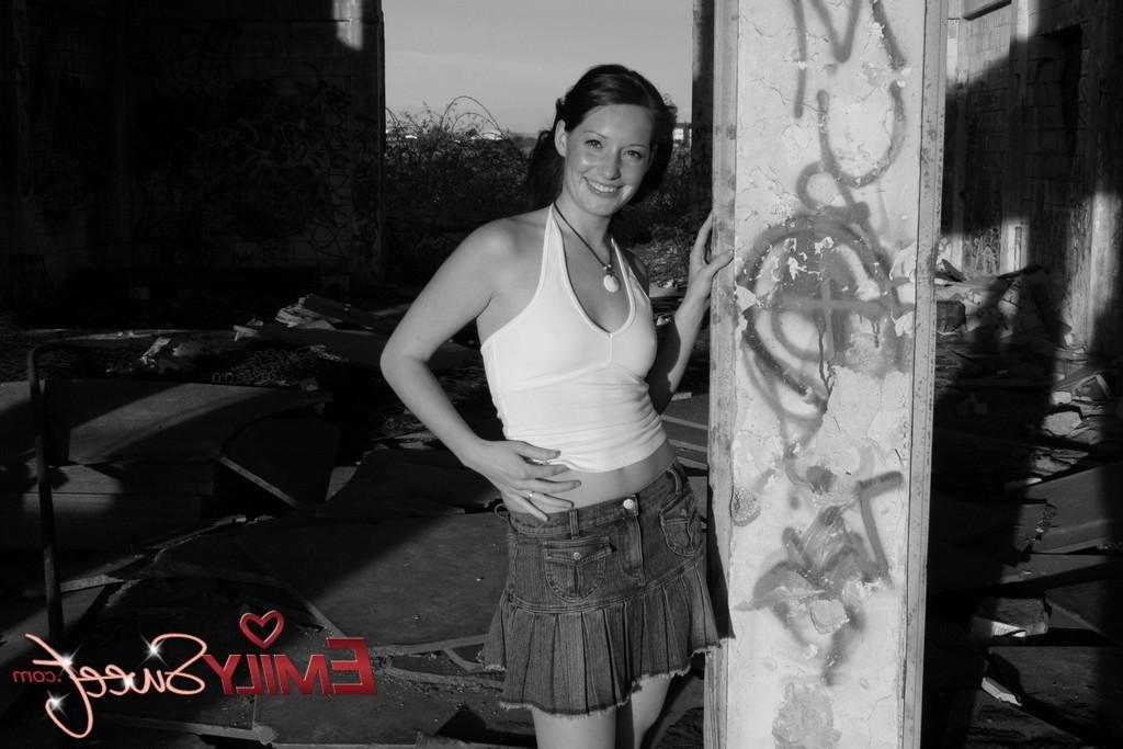 20P Pictures of teen model Emily Sweet flashing in black and white