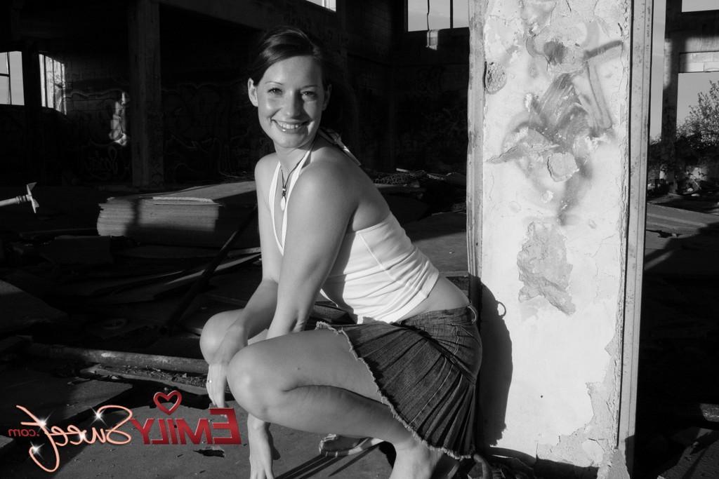 20P Pictures of teen model Emily Sweet flashing in black and white